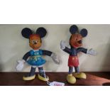 A pair of vintage coloured rubber Mickey & Minnie Mouse figures, 16cm high.