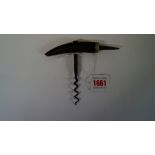 An antique corkscrew.