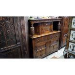 A reproduction carved oak court cupboard, 127cm wide.