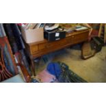 A Georgian mahogany square piano converted into a desk.