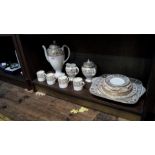 A Wedgwood 'Gold Florentine' pattern coffee set for four.