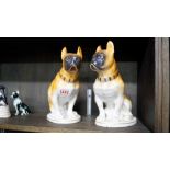 A pair of USSR porcelain pugs, 21.5cm high.