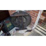 An Islamic brass and silvered large circular tray, on carved wood folding stand,