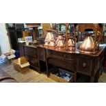 A late Victorian mahogany and satinwood crossbanded bowfront sideboard, 168cm wide.