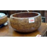 A burr walnut circular bowl, 21.5cm diameter.