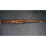 Ethnographica: a carved wood tribal figural walking stick.