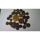 A small quantity of coins and tokens; together with a Victorian 1886 Liverpool Exhibition medal.