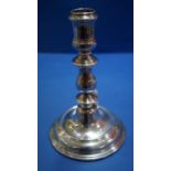 A Georgian style silver candlestick, marks rubbed, London, 16cm, weighted.