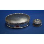 An engine turned oval silver jewellery box, by Percy James Finch, Birmingham 1922,