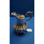 A Victorian silver milk jug, by John & Henry Lias, London 1844, 14cm, 266g.