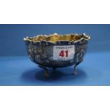 A .800 sugar bowl, having floral repousse decoration, 10cm.