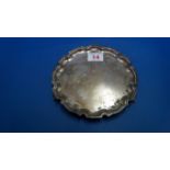 A silver waiter, by Adie Brothers Ltd, Birmingham 1940, having raised pie crust rim, 15.5cm, 129g.