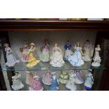 A collection of twenty-six Wedgwood biscuit ware figures;