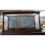 An antique mahogany cased ship's diorama, 60.5cm wide.