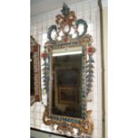 A polychrome painted framed wall mirror, 88cm x 42cm.