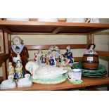 A collection of Victorian Staffordshire pottery; together with a majolica figural jug;