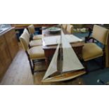 An old painted wood pond yacht, the hull 90cm long.