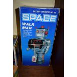 A battery operated Space Walk man, boxed.