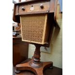 A 19th century mahogany drop leaf work table, on pedestal base, 42.5cm wide.