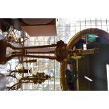 A pair of old neo-classical style gilt wood table lamps, in the manner of Robert Adam,