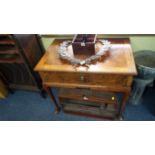 An antique figured walnut, feather and crossbanded low boy, 83cm wide.