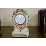 A Louis XVI style alabaster and gilt metal mounted timepiece, with watch type movement, 14.5cm high.