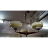 A 1930s chrome and Bakelite three branch ceiling light.