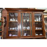 A circa 1900 oak side cabinet, with leaded and stained glass central panel to the upper section,