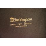 A cased set of six Buckingham cut crystal glasses.