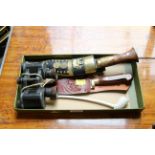 A pair of antique binoculars; together with a kukri and sheath; another knife in sheath;
