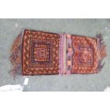 An Afghan Baluch carpet saddle bag.