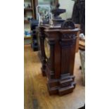 A circa 1900 French walnut mantel clock, striking on two gongs, 52cm high.