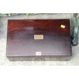 A 19th century rosewood writing slope, 40.5cm wide, stamped 'Lund Maker, Cornhill'.