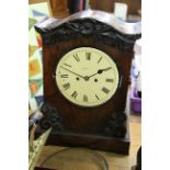 An early Victorian rosewood twin fusee bracket type clock,