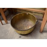 A Victorian brass swing handled preserving pan, 48cm diameter.