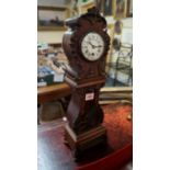 A late 19th/early 20th century mahogany and brass mounted miniature longcase timepiece, 48.5cm high.