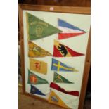 A framed display of Scout jamboree pennants, circa 1920s-30s.