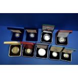 Nine various English silver proof coins.