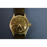 A 1943 Bulova military issue gentleman's mechanical wristwatch, type A11, serial number AF43 85665,