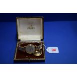 A vintage boxed Smiths Astral 9ct gold gentleman's wristwatch,