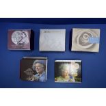 Three cased silver proof commemorative crowns,