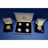 Four Royal Mint silver £1 commemorative coins,