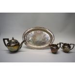 An Oriental silver three piece teaset and matching tray, the teaset by TH, the tray by TL,