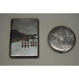 A Japanese silver niello cigarette case, stamped 'silver 950 Okubo',