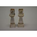 A near pair of unusual Chinese bone pedestals, late Qing, each engraved with four character script,