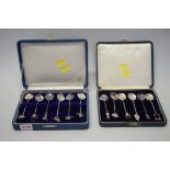 Two cased sets of six Oriental sterling novelty teaspoons, 96g.