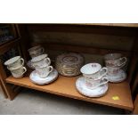 A Royal Doulton 'Canton' pattern part tea service; together with two similar 'Juliet' pattern cups.