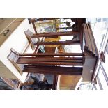 A nest of Edwardian mahogany and inlaid quartetto tables, each with glass inset top, largest 51.