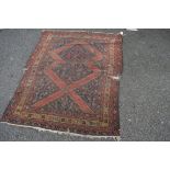 A North West Persian rug fragment; together with a Pakistan Bokhara runner, largest 160 x 127cm.