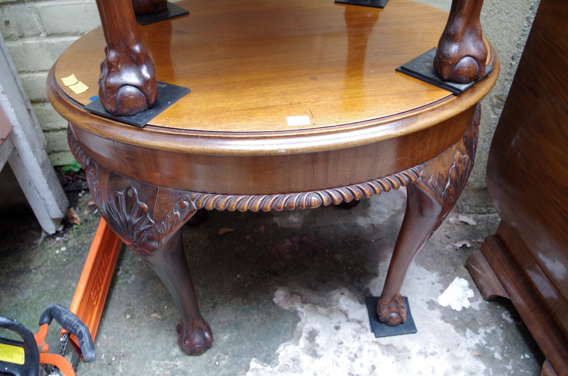 A pair of 1930s carved mahogany oval occasional tables, 64cm wide. - Image 2 of 2